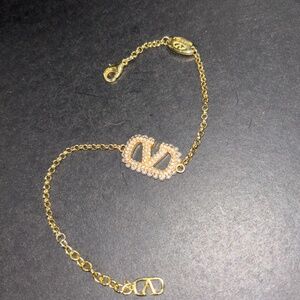 Demure Valentino V Logo Pearl and Swarovski Crystal Inlay, Sparkling!